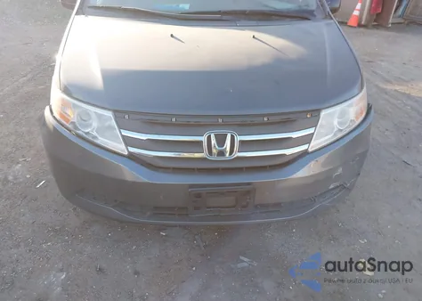 2012 Honda Odyssey Ex-L z USA, uszkodzony, nr VIN 5FNRL5H65CB094452